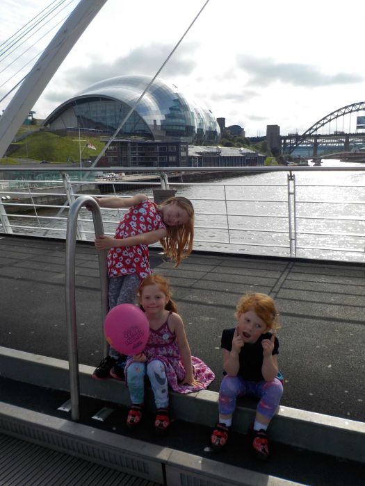 Posing on the bridge over the river Tyne