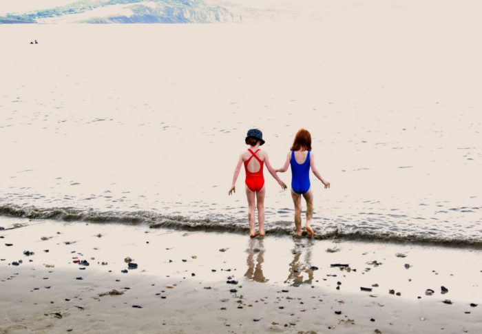 Paddling in the sea at Lyme Regis